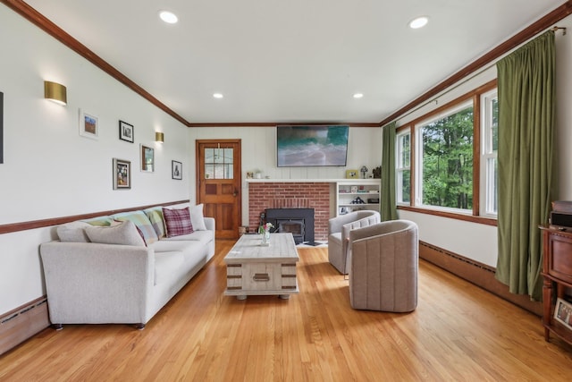 275 Otterkill Rd, Cornwall, NY 12553 - living room with ornamental molding, a baseboard heating unit, light wood-type flooring, a brick fireplace, and recessed lighting