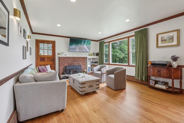 275 Otterkill Rd, Cornwall, NY 12553 - living room featuring ornamental molding, light wood-type flooring, recessed lighting, and a fireplace
