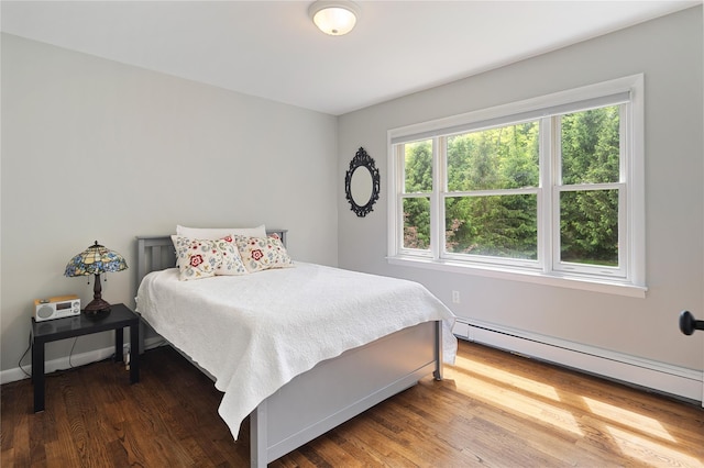 50 Kerry Ln, Chappaqua, NY 10514 - bedroom with wood finished floors, a baseboard heating unit, and baseboards