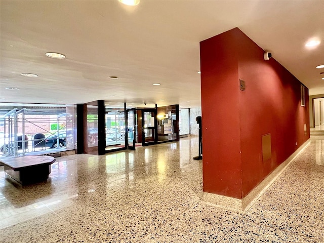 142-05 Roosevelt Ave Unit 301, Flushing, NY 11354 - building lobby featuring recessed lighting and a surveillance system