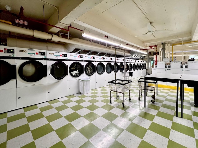 142-05 Roosevelt Ave Unit 301, Flushing, NY 11354 - shared laundry room featuring washing machine and dryer and tile patterned floors