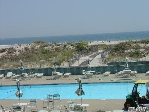 750 Lido Blvd Unit 38B, Long Beach, NY 11561 - community pool with a patio and a water view
