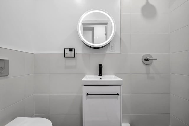 99-52 66th Rd Unit 3G, Rego Park, NY 11374 - bathroom featuring tile walls and vanity