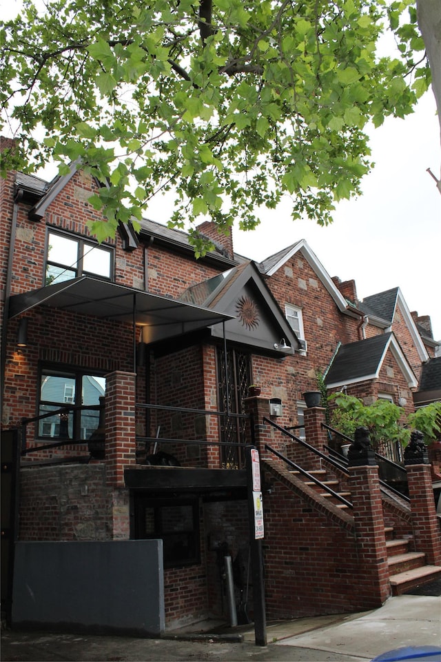 1234East37thStreet E, Brooklyn, NY 11210 - view of front of house featuring stairs and brick siding