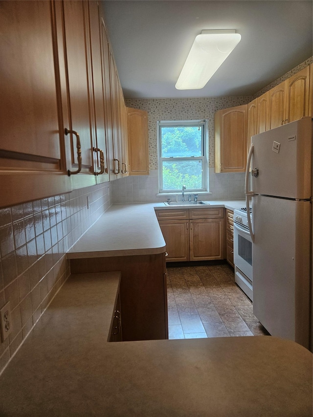 1361 Broadway Unit B26, Hewlett, NY 11557 - kitchen with white appliances, a sink, tasteful backsplash, light tile patterned flooring, and light countertops