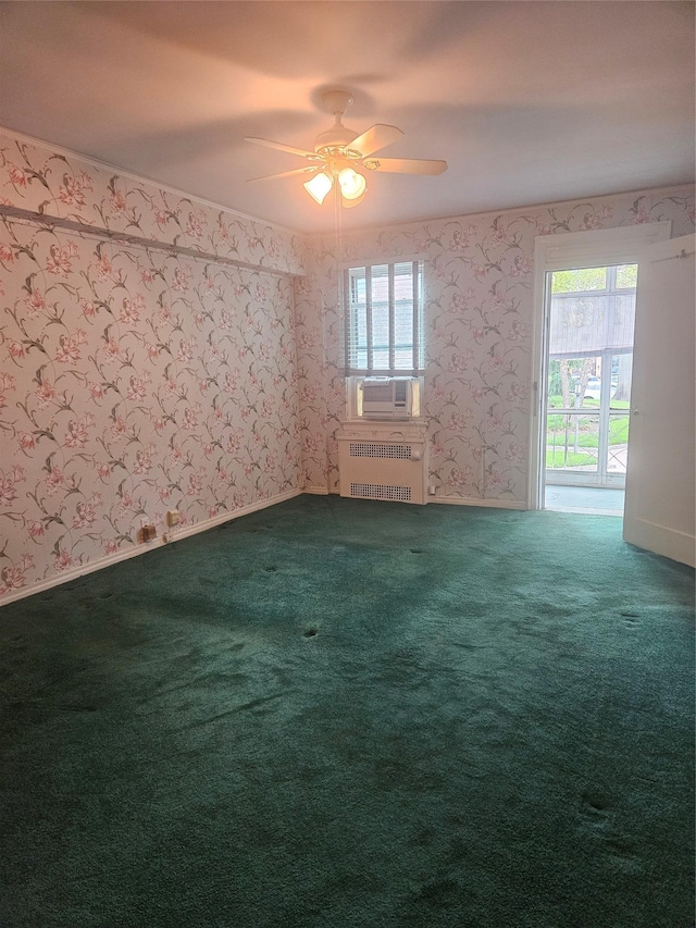 1361 Broadway Unit B26, Hewlett, NY 11557 - carpeted empty room featuring radiator, wallpapered walls, plenty of natural light, and ceiling fan