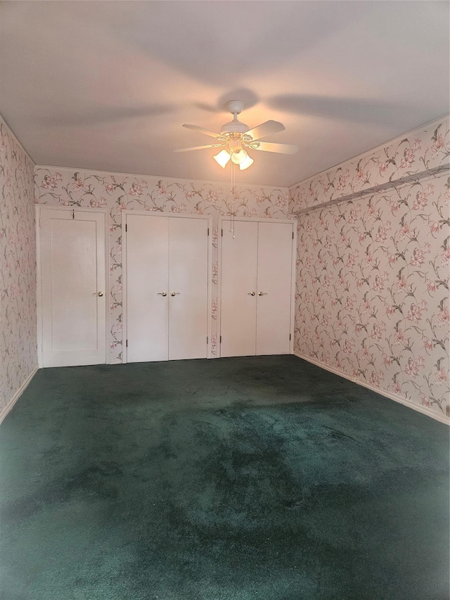1361 Broadway Unit B26, Hewlett, NY 11557 - unfurnished room with wallpapered walls, dark colored carpet, a ceiling fan, and baseboards