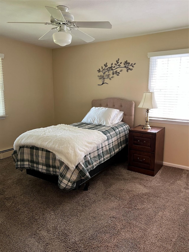 662 Gillette Ave, Bayport, NY 11705 - bedroom featuring carpet flooring, a baseboard heating unit, baseboards, and ceiling fan