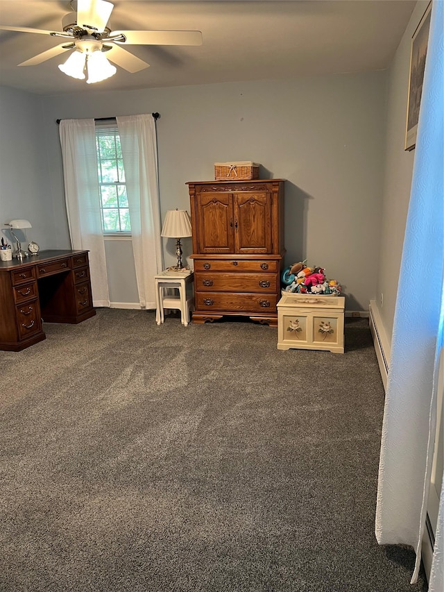 662 Gillette Ave, Bayport, NY 11705 - bedroom with baseboard heating, dark colored carpet, a ceiling fan, and a desk