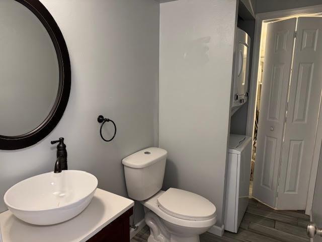 350 N Water St Unit 1-7, Newburgh, NY 12550 - bathroom with toilet, vanity, and wood finished floors
