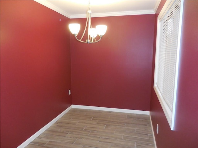 350 N Water St Unit 1-7, Newburgh, NY 12550 - unfurnished room with a chandelier, wood finished floors, baseboards, and ornamental molding