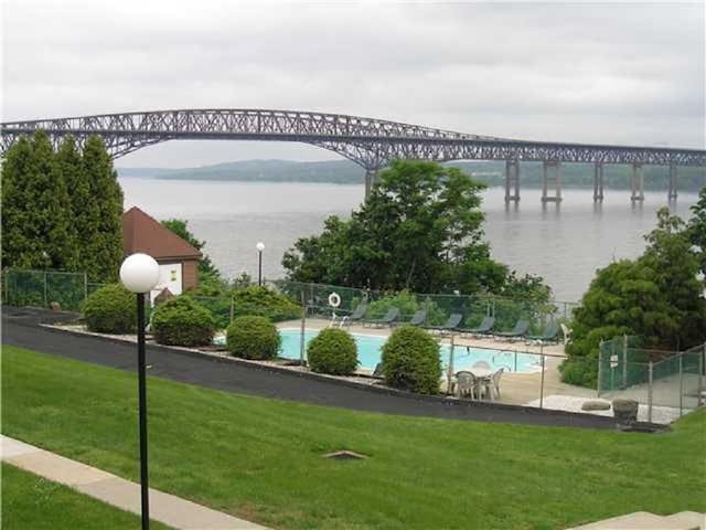 350 N Water St Unit 1-7, Newburgh, NY 12550 - view of property's community with a pool and a water view