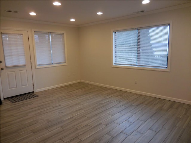 350 N Water St Unit 1-7, Newburgh, NY 12550 - unfurnished room with baseboards, wood finished floors, crown molding, and recessed lighting