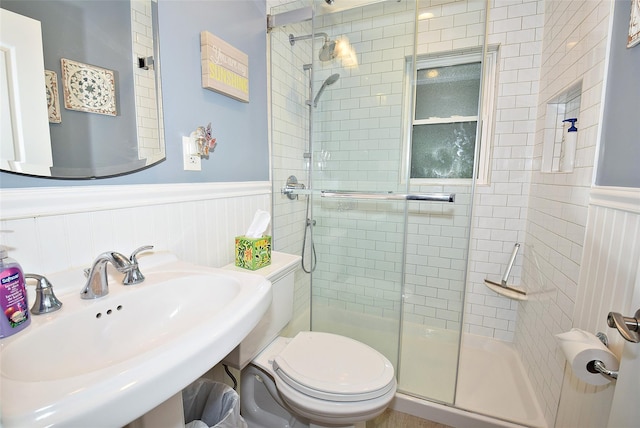 145 Gerard Ave, New Hyde Park, NY 11040 - full bath with a wainscoted wall and a stall shower