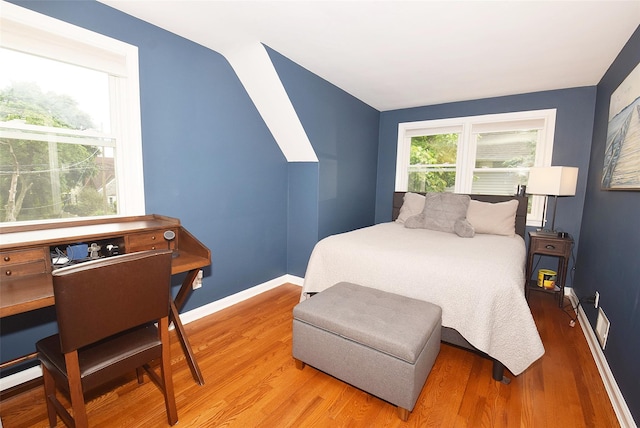 145 Gerard Ave, New Hyde Park, NY 11040 - bedroom with wood finished floors and a desk