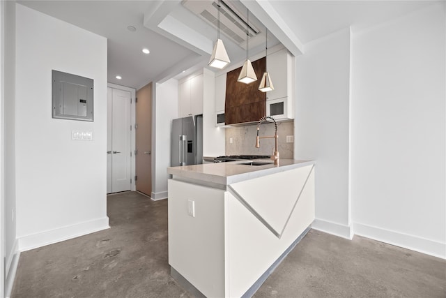 20 Melrose St Unit 4F, Brooklyn, NY 11206 - kitchen with concrete floors, electric panel, stainless steel fridge with ice dispenser, modern cabinets, and white cabinetry