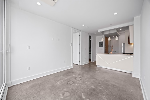 20 Melrose St Unit 4F, Brooklyn, NY 11206 - unfurnished living room featuring concrete flooring, recessed lighting, and baseboards