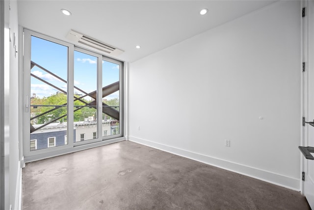 20 Melrose St Unit 4F, Brooklyn, NY 11206 - unfurnished room featuring finished concrete floors, baseboards, and recessed lighting