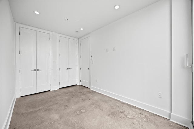 20 Melrose St Unit 4F, Brooklyn, NY 11206 - unfurnished bedroom featuring concrete floors, multiple closets, recessed lighting, and baseboards