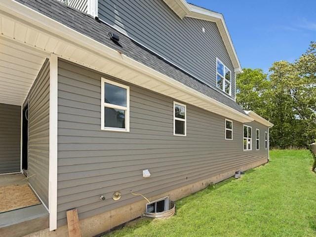 114 W End Dr, Shirley, NY 11967 - view of home's exterior with a lawn and a shingled roof