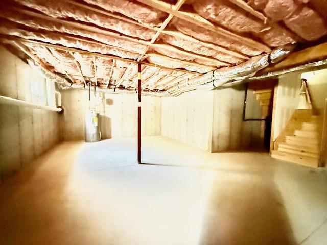 114 W End Dr, Shirley, NY 11967 - unfinished basement featuring stairway and water heater