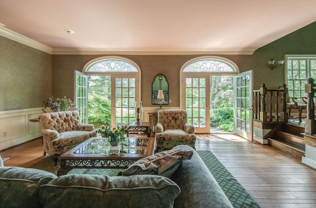 189 Freedom Rd, Pleasant Valley, NY 12569 - living room featuring wood-type flooring, plenty of natural light, wainscoting, and ornamental molding