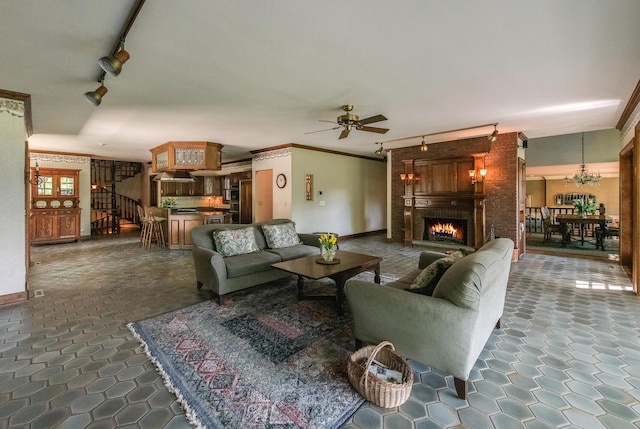 189 Freedom Rd, Pleasant Valley, NY 12569 - living room featuring rail lighting, ceiling fan, a fireplace, baseboards, and ornamental molding