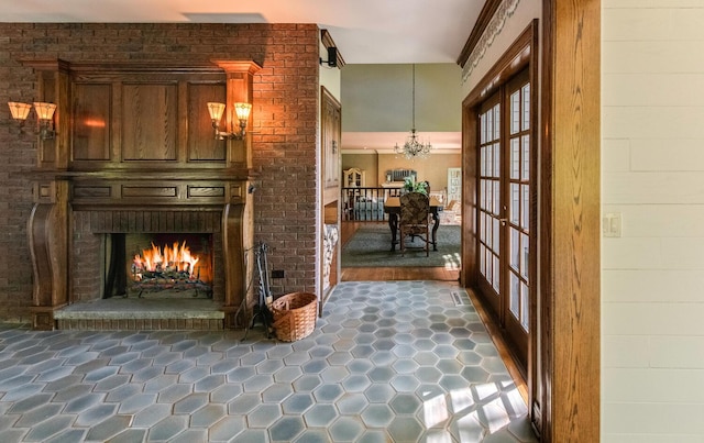 189 Freedom Rd, Pleasant Valley, NY 12569 - living area featuring a fireplace, a chandelier, and french doors