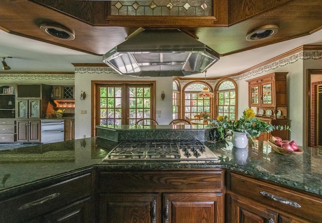 189 Freedom Rd, Pleasant Valley, NY 12569 - kitchen with stainless steel gas cooktop, exhaust hood, french doors, crown molding, and dark stone counters