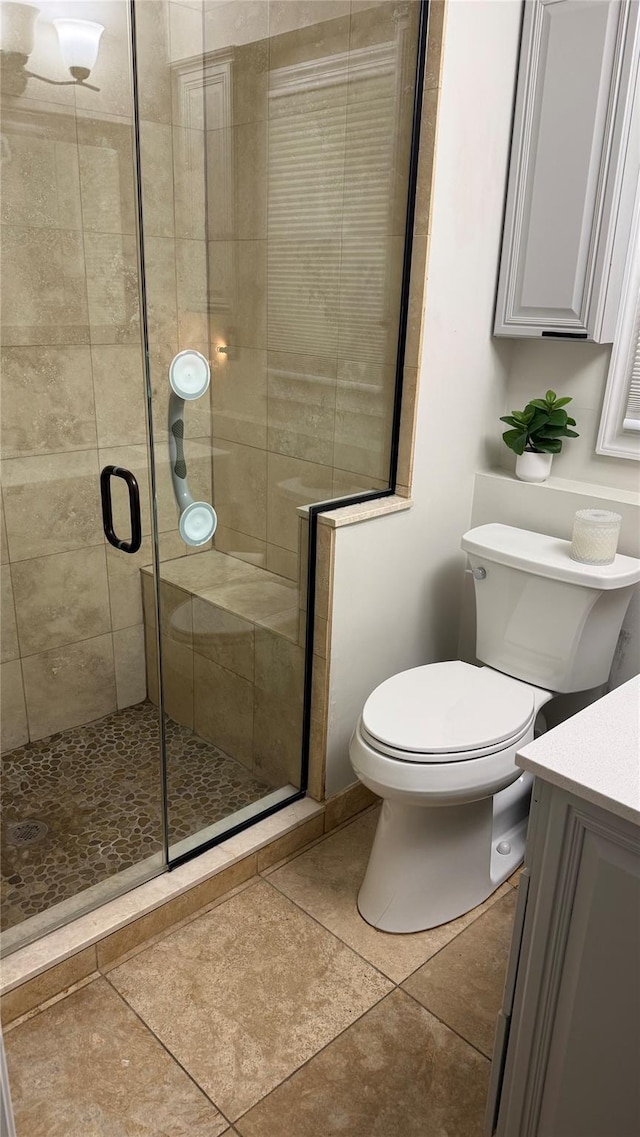 15 Spruce Ct, Nanuet, NY 10954 - full bathroom featuring vanity, toilet, a shower stall, and tile patterned floors