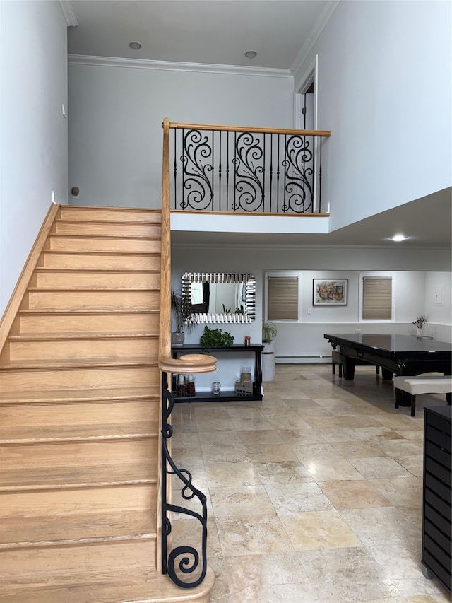 15 Spruce Ct, Nanuet, NY 10954 - stairway with crown molding, a baseboard heating unit, and billiards table