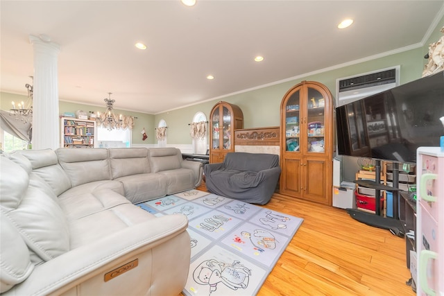 3225 155th St, Flushing, NY 11354 - living room with a chandelier, light wood-type flooring, ornamental molding, recessed lighting, and decorative columns