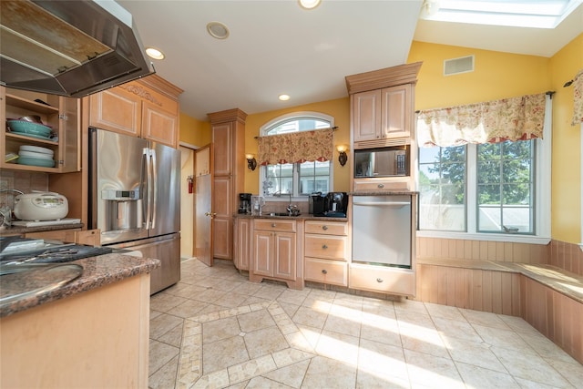 3225 155th St, Flushing, NY 11354 - kitchen featuring oven, stainless steel fridge, range hood, built in microwave, and light tile patterned flooring