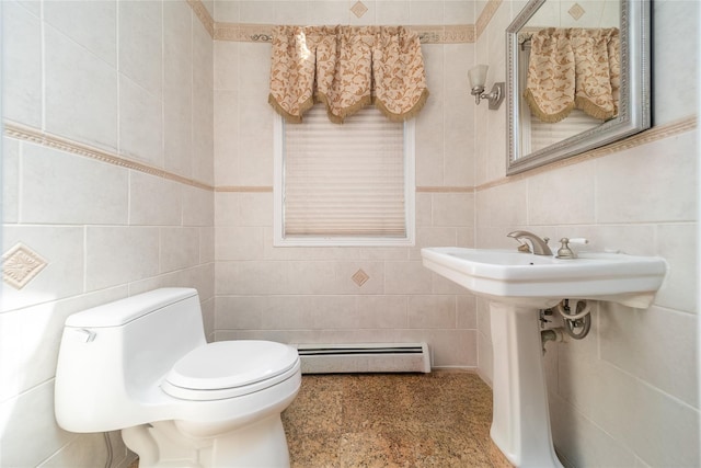 3225 155th St, Flushing, NY 11354 - bathroom with a baseboard radiator, tile walls, and toilet