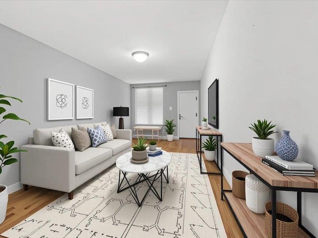 429 Revere Ave, Bronx, NY 10465 - living room featuring light wood-type flooring and baseboards