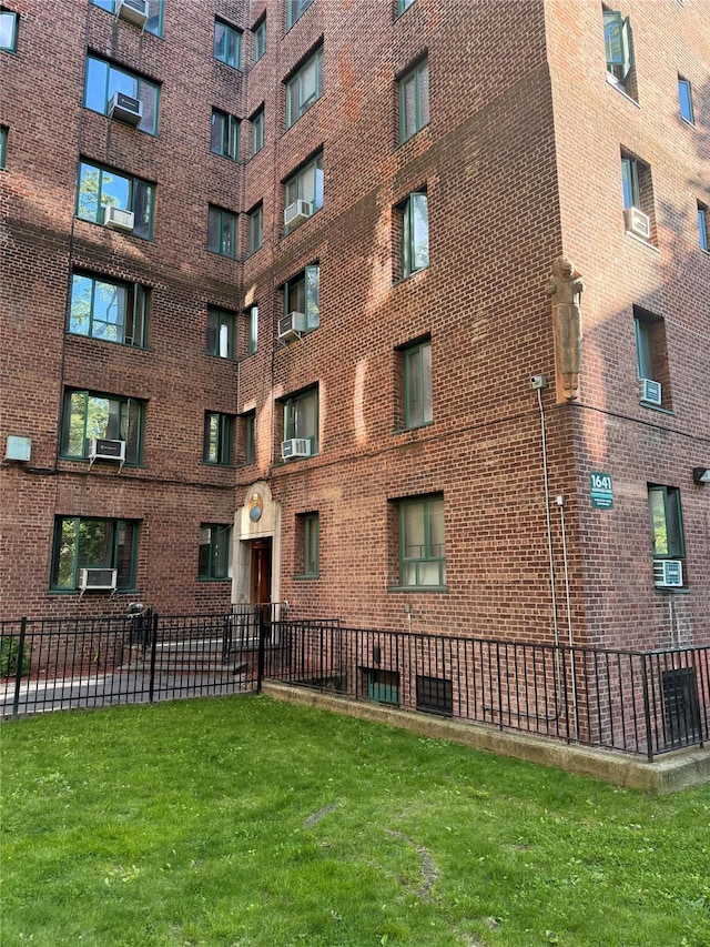 view of apartment building / complex with cooling unit