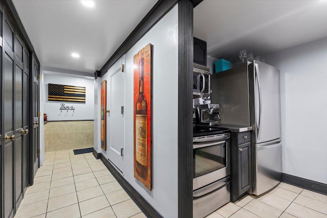 1444 Gillespie Ave, Bronx, NY 10461 - kitchen featuring appliances with stainless steel finishes, light tile patterned floors, recessed lighting, dark cabinetry, and baseboards