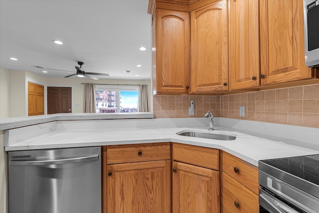 51 W Broadway Unit A, Long Beach, NY 11561 - kitchen featuring dishwasher, a sink, a ceiling fan, recessed lighting, and brown cabinets