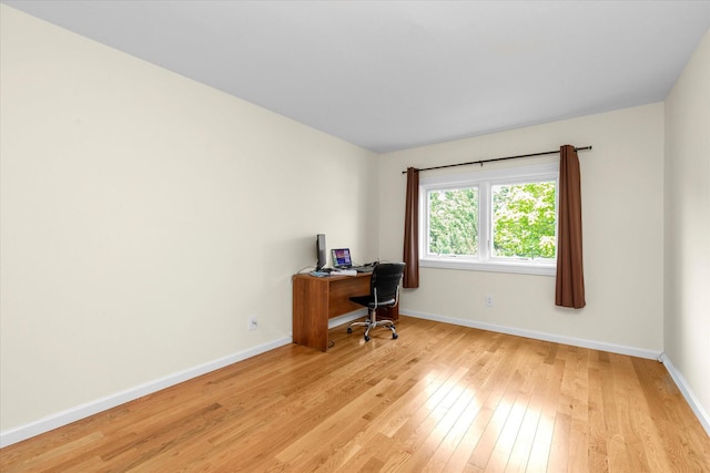 51 W Broadway Unit A, Long Beach, NY 11561 - home office featuring light wood-style floors and baseboards