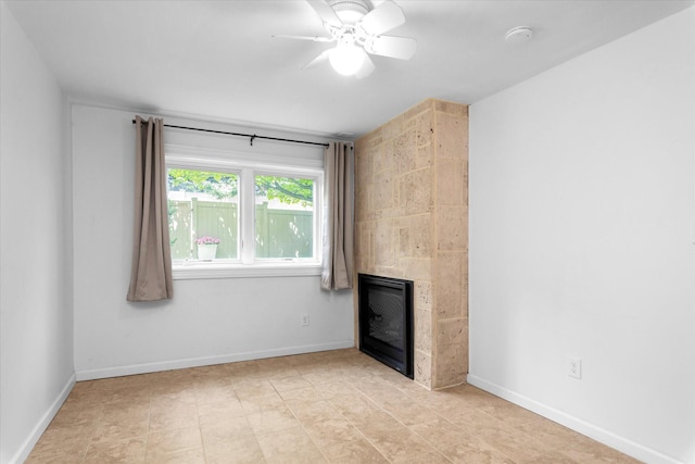 51 W Broadway Unit A, Long Beach, NY 11561 - unfurnished living room with a tile fireplace, a ceiling fan, and baseboards