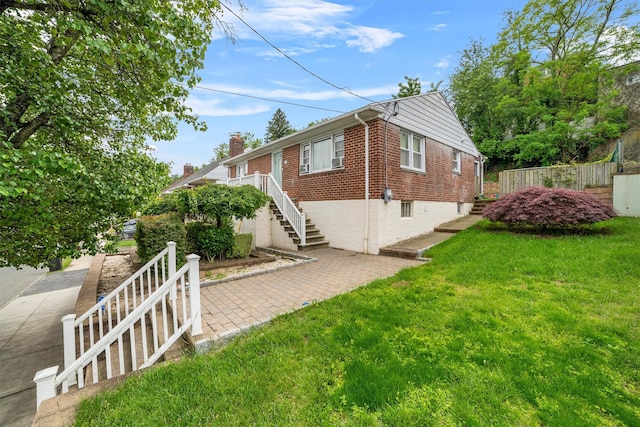 773 Mile Square Rd, Yonkers, NY 10704 - view of property exterior featuring brick siding, stairs, and a chimney