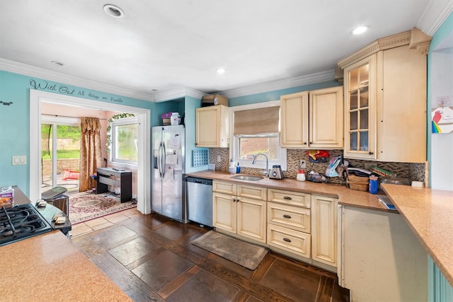 773 Mile Square Rd, Yonkers, NY 10704 - kitchen featuring stainless steel appliances, cream cabinets, a sink, light countertops, and crown molding