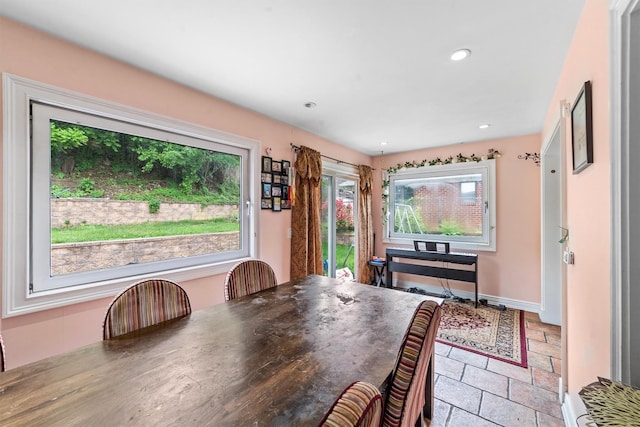 773 Mile Square Rd, Yonkers, NY 10704 - dining room with stone tile flooring, baseboards, and recessed lighting