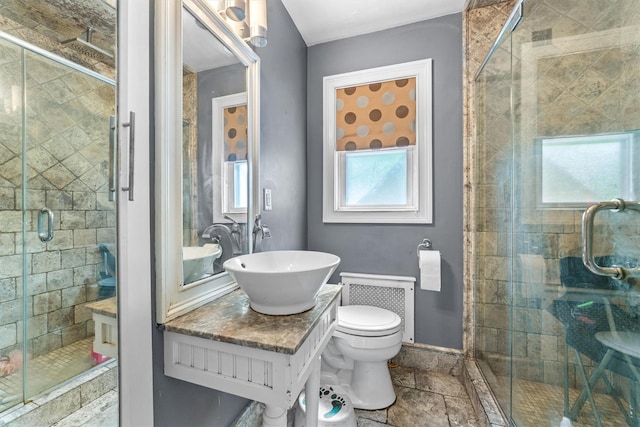773 Mile Square Rd, Yonkers, NY 10704 - bathroom featuring a shower stall, plenty of natural light, and toilet