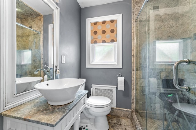 773 Mile Square Rd, Yonkers, NY 10704 - bathroom with a tile shower, healthy amount of natural light, and toilet