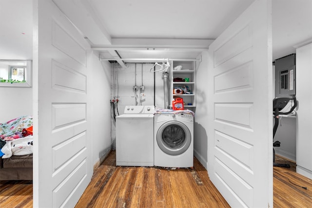 773 Mile Square Rd, Yonkers, NY 10704 - laundry room featuring wood finished floors, electric panel, and independent washer and dryer