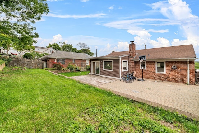 773 Mile Square Rd, Yonkers, NY 10704 - rear view of property featuring a chimney and a patio area