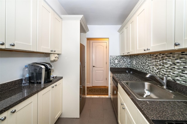 60 Locust Unit A-609, New Rochelle, NY 10801 - kitchen with a sink, stainless steel dishwasher, decorative backsplash, white cabinetry, and dark tile patterned flooring