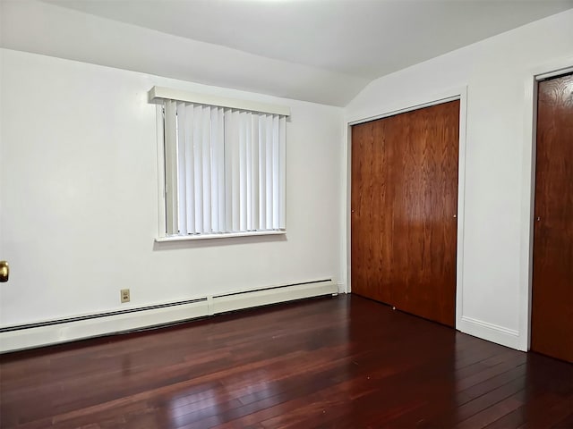 154-70 11th Ave, Whitestone, NY 11357 - unfurnished bedroom with a baseboard radiator, wood-type flooring, and vaulted ceiling