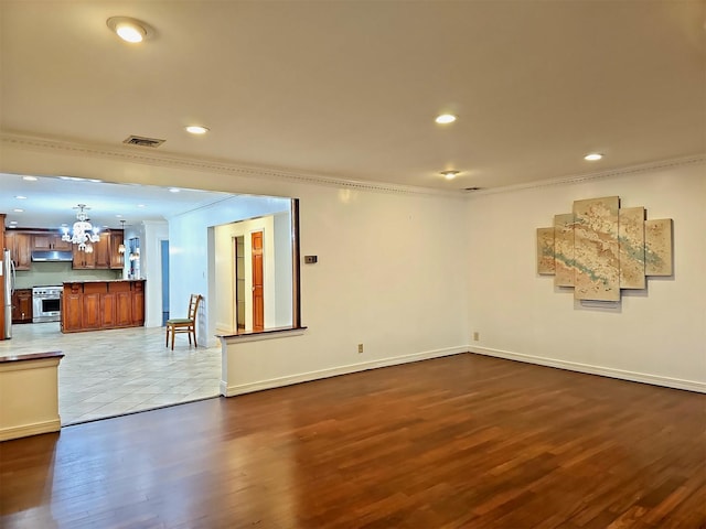 154-70 11th Ave, Whitestone, NY 11357 - unfurnished living room featuring crown molding, a chandelier, dark wood finished floors, recessed lighting, and baseboards